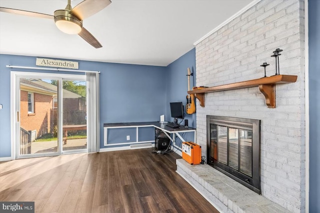 316 Grove Ave, Gordonsville, VA 22942 - living area with a ceiling fan, a fireplace, and wood finished floors