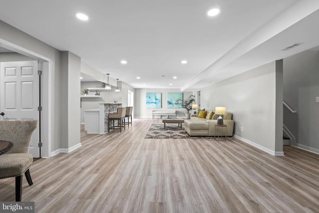 7806 Shawmont Rd, Fredericksburg, VA 22407 - living room with baseboards, light wood-style floors, recessed lighting, and stairs