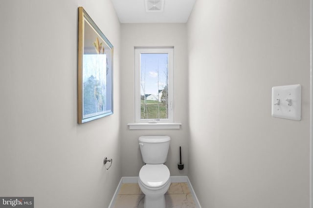 7806 Shawmont Rd, Fredericksburg, VA 22407 - bathroom with baseboards, marble finish flooring, and toilet