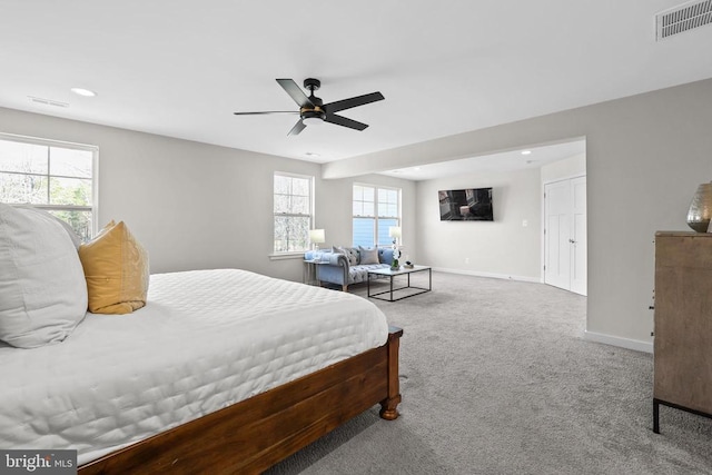 7806 Shawmont Rd, Fredericksburg, VA 22407 - carpeted bedroom with multiple windows, baseboards, recessed lighting, and ceiling fan