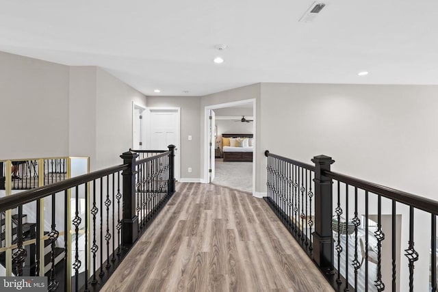 7806 Shawmont Rd, Fredericksburg, VA 22407 - hallway with an upstairs landing, wood finished floors, recessed lighting, and baseboards