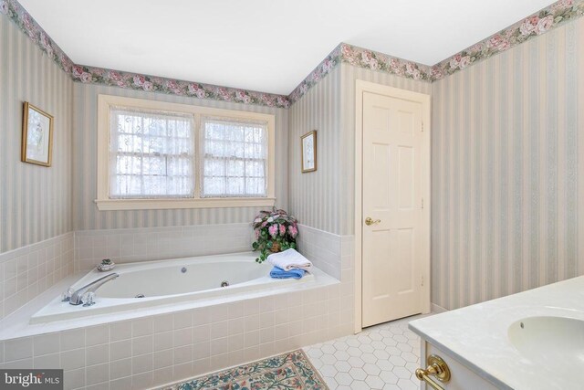 8413 Pathfinders Ct, Spotsylvania, VA 22553 - bathroom featuring a tub with jets, tile patterned floors, vanity, and wallpapered walls