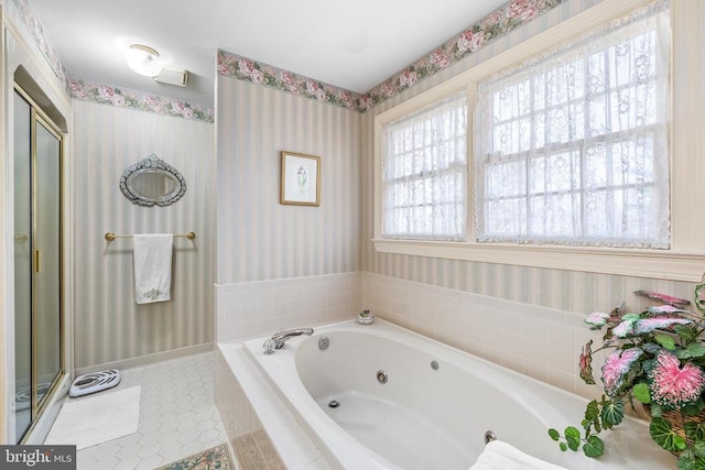 8413 Pathfinders Ct, Spotsylvania, VA 22553 - full bath with a tub with jets, tile patterned floors, a stall shower, baseboards, and wallpapered walls