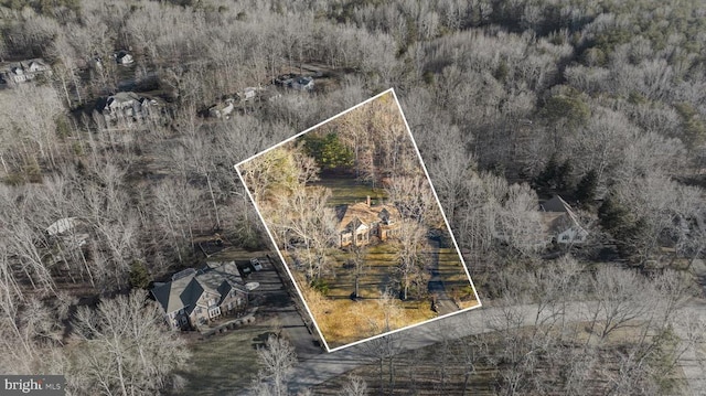 8413 Pathfinders Ct, Spotsylvania, VA 22553 - drone / aerial view featuring a wooded view