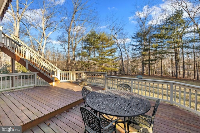 8413 Pathfinders Ct, Spotsylvania, VA 22553 - wooden deck with outdoor dining area and stairway