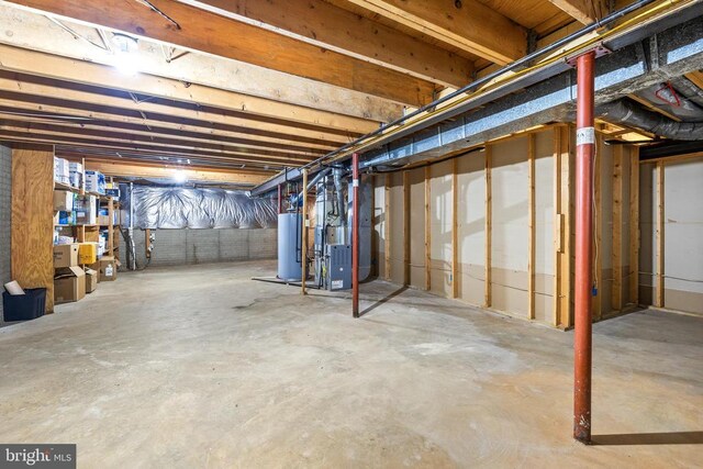 8413 Pathfinders Ct, Spotsylvania, VA 22553 - unfinished basement featuring heating unit and gas water heater