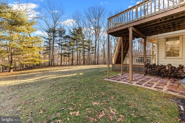 8413 Pathfinders Ct, Spotsylvania, VA 22553 - view of yard with a patio, stairway, and a deck