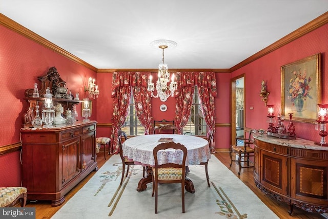 8413 Pathfinders Ct, Spotsylvania, VA 22553 - dining space with ornamental molding, an inviting chandelier, wood finished floors, and wallpapered walls