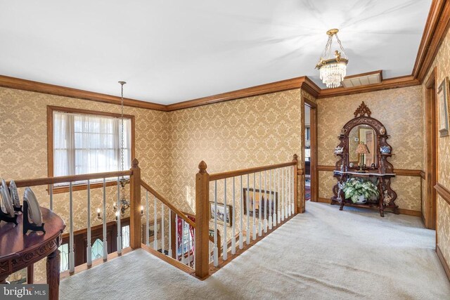 8413 Pathfinders Ct, Spotsylvania, VA 22553 - hallway with wallpapered walls, a chandelier, and carpet