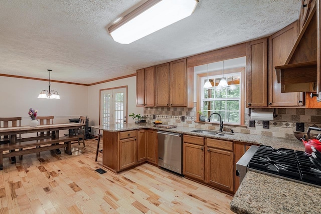 4201 Brown Mountain Ln, Elkton, VA 22827 - kitchen featuring appliances with stainless steel finishes, a textured ceiling, a peninsula, custom range hood, and brown cabinetry