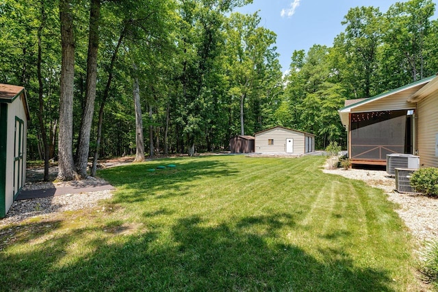 4201 Brown Mountain Ln, Elkton, VA 22827 - view of green lawn featuring a storage unit and a view of trees
