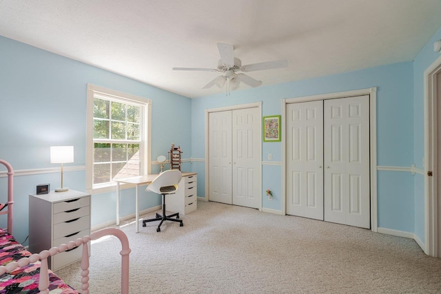 4201 Brown Mountain Ln, Elkton, VA 22827 - carpeted bedroom featuring multiple closets and a ceiling fan