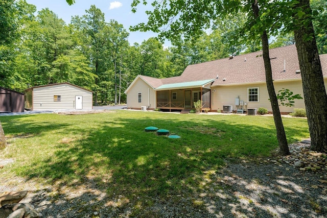 4201 Brown Mountain Ln, Elkton, VA 22827 - view of green lawn with an outbuilding and a sunroom