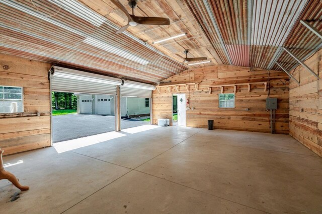 4201 Brown Mountain Ln, Elkton, VA 22827 - garage with wood walls and ceiling fan
