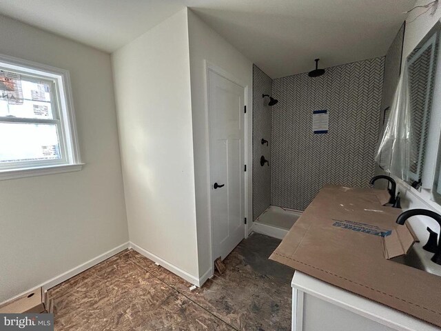 104 Haven Ct, Charlottesville, VA 22911 - bathroom featuring a shower stall, baseboards, and vanity