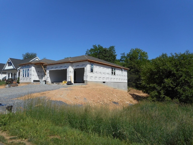 8341 Rock Creek Rd, Mcgaheysville, VA 22840 - view of side of property featuring a garage, crawl space, and driveway