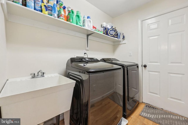 12011 Big Ben Blvd, Fredericksburg, VA 22407 - laundry area featuring light wood finished floors and washer and dryer