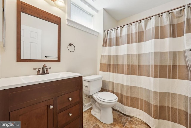 12011 Big Ben Blvd, Fredericksburg, VA 22407 - bathroom featuring toilet, vanity, and curtained shower