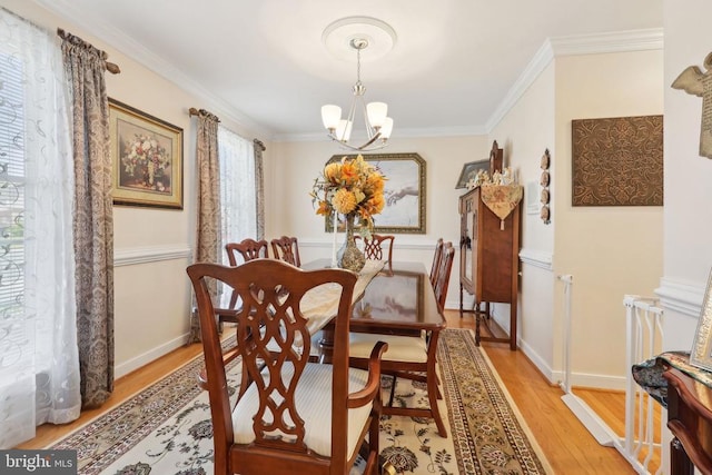 12011 Big Ben Blvd, Fredericksburg, VA 22407 - dining room featuring a chandelier, light wood-style flooring, ornamental molding, and baseboards