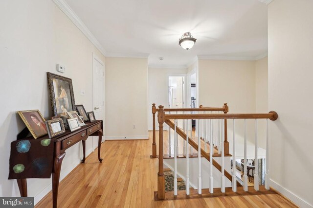 12011 Big Ben Blvd, Fredericksburg, VA 22407 - hallway featuring an upstairs landing, light wood-style flooring, ornamental molding, and baseboards