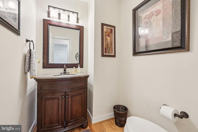 12011 Big Ben Blvd, Fredericksburg, VA 22407 - bathroom with toilet, wood finished floors, baseboards, and vanity