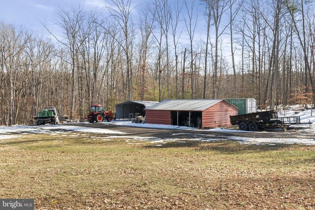 exterior space with a carport