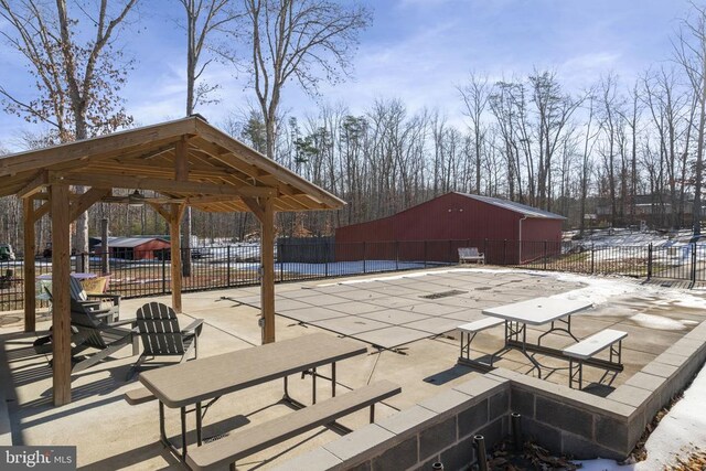 view of snow covered patio