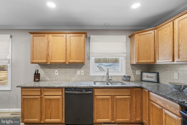 kitchen featuring ornamental molding, dark stone counters, dishwasher, and sink