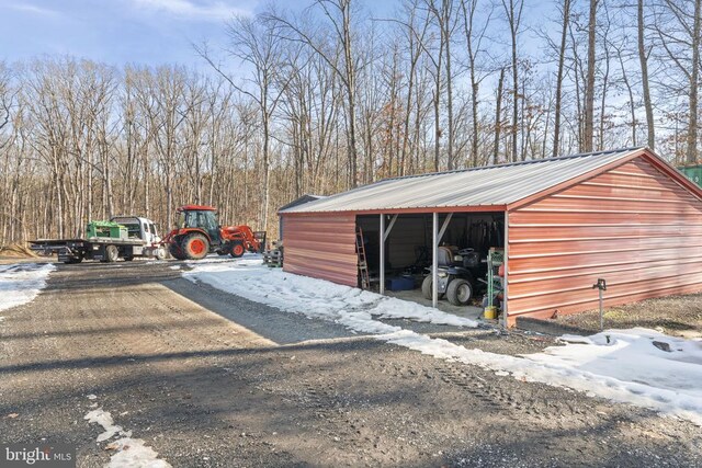 view of snow covered garage