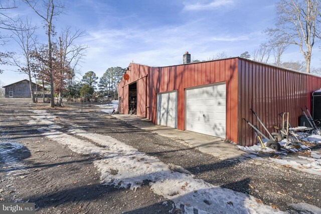 view of outdoor structure with a garage