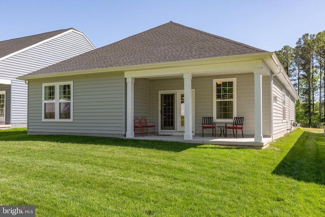 6104 New Berne Rd, Fredericksburg, VA 22407 - back of house with a shingled roof and a yard