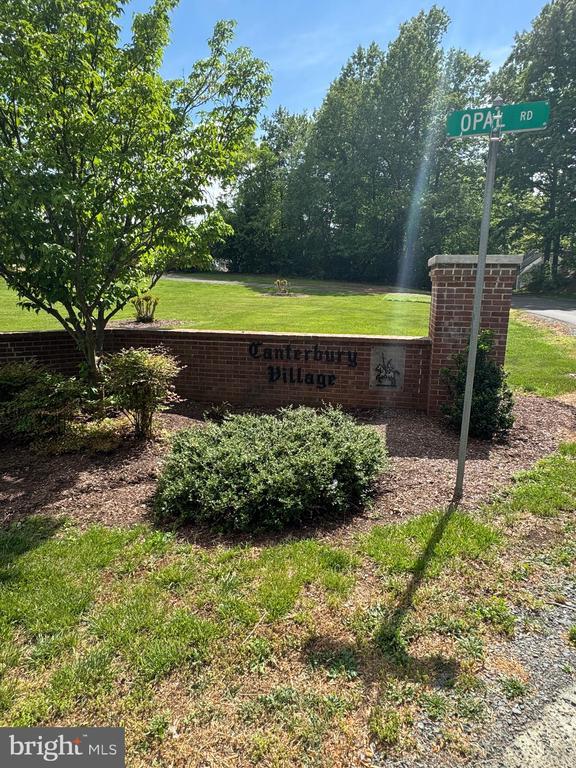 7880 Sir Topas Dr, Warrenton, VA 20186 - community / neighborhood sign with a yard