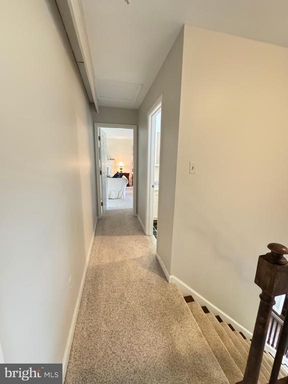 7880 Sir Topas Dr, Warrenton, VA 20186 - corridor featuring light carpet and baseboards