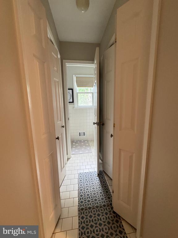7880 Sir Topas Dr, Warrenton, VA 20186 - hallway featuring light tile patterned flooring
