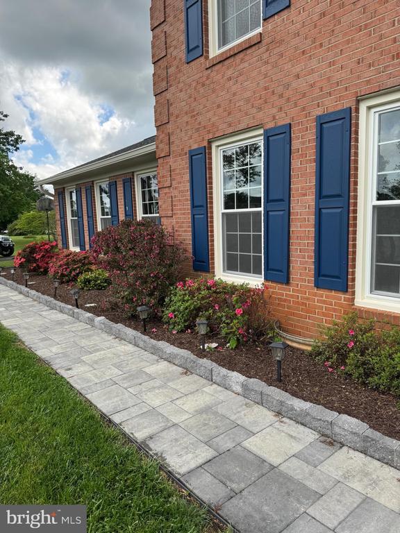 7880 Sir Topas Dr, Warrenton, VA 20186 - doorway to property with brick siding