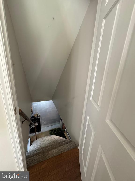 7880 Sir Topas Dr, Warrenton, VA 20186 - stairs with wood finished floors