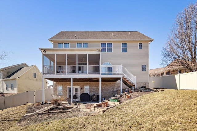 102 Shawn Cir, Staunton, VA 24401 - back of property with a fenced backyard, a sunroom, stairs, and a lawn