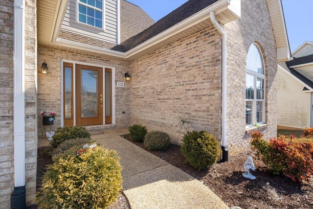 102 Shawn Cir, Staunton, VA 24401 - view of exterior entry with roof with shingles and brick siding