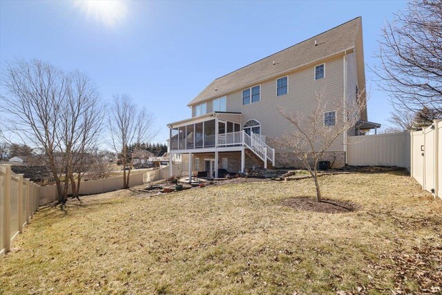 102 Shawn Cir, Staunton, VA 24401 - rear view of property with a fenced backyard, a sunroom, stairs, and a yard