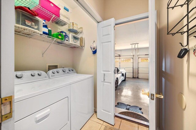 102 Shawn Cir, Staunton, VA 24401 - laundry area with washing machine and clothes dryer, light tile patterned flooring, and laundry area