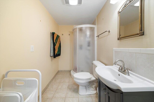 102 Shawn Cir, Staunton, VA 24401 - bathroom featuring toilet, visible vents, a stall shower, tile patterned flooring, and baseboards