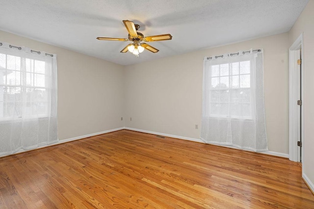 5 Granary Rd, Verona, VA 24482 - unfurnished room with light wood finished floors, ceiling fan, and baseboards