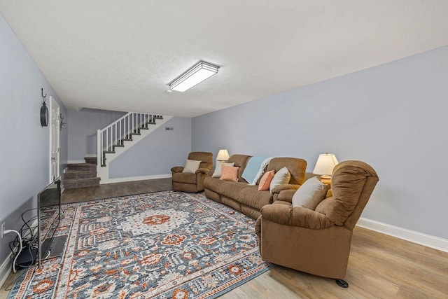 5 Granary Rd, Verona, VA 24482 - living room featuring wood finished floors, stairs, baseboards, and a textured ceiling