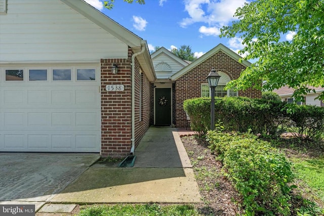 1538 Willow St, Culpeper, VA 22701 - view of front facade featuring brick siding and an attached garage