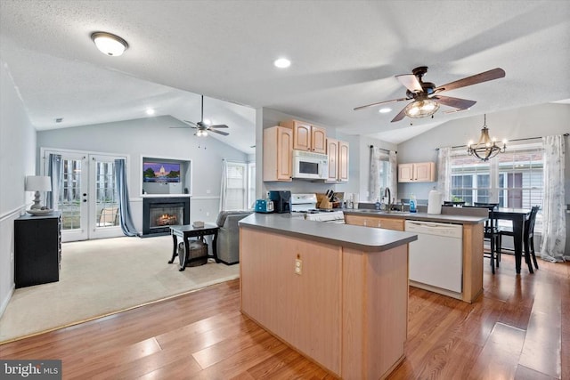 1538 Willow St, Culpeper, VA 22701 - kitchen featuring white appliances, vaulted ceiling, a ceiling fan, light brown cabinetry, and plenty of natural light