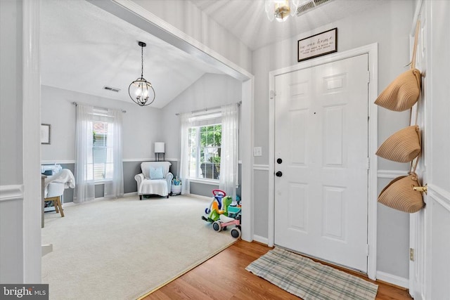1538 Willow St, Culpeper, VA 22701 - entrance foyer featuring lofted ceiling, a chandelier, and wood finished floors