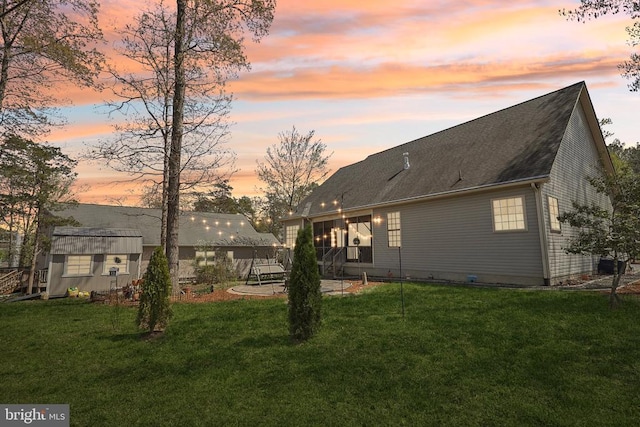 514 Lakeview Pkwy, Locust Grove, VA 22508 - back of property featuring a lawn, a patio, and an outbuilding