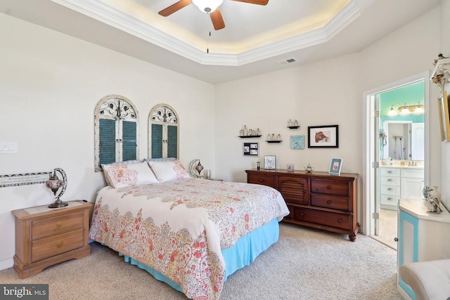 514 Lakeview Pkwy, Locust Grove, VA 22508 - bedroom with light colored carpet, ornamental molding, a tray ceiling, ceiling fan, and ensuite bathroom