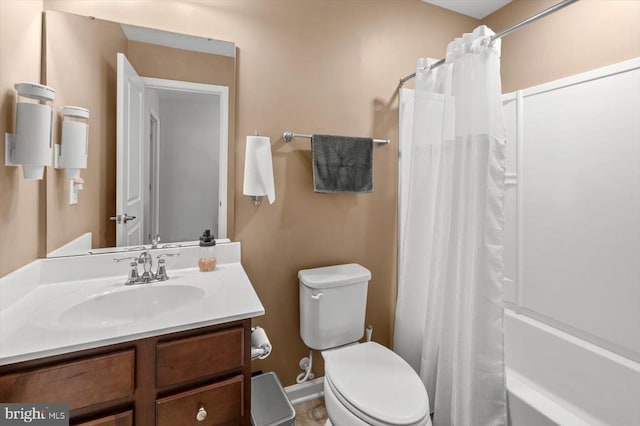 full bath with toilet, shower / tub combo, and vanity