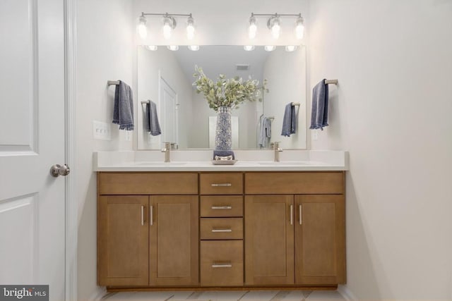 10621 Afton Grove Ct, Fredericksburg, VA 22408 - bathroom with a sink, double vanity, baseboards, and visible vents